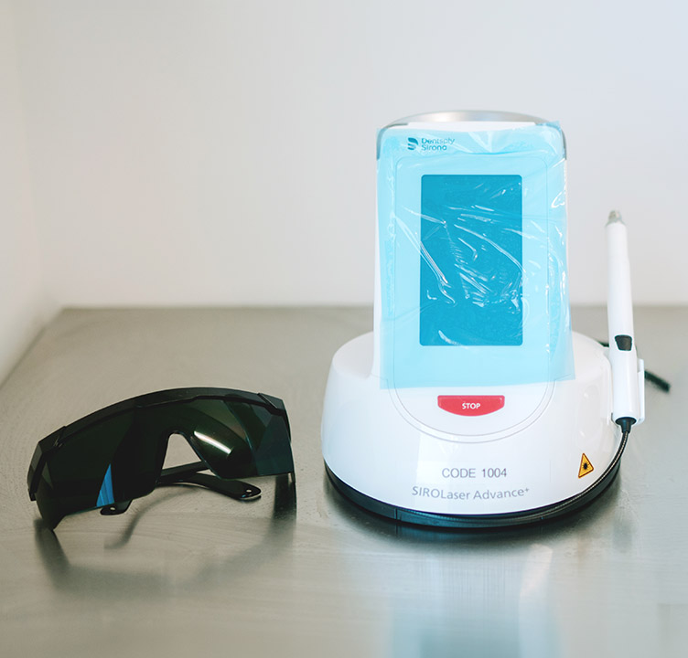 Portable SIROLaser Advance Plus device used for non-invasive, biological soft-tissue dental hygiene care.