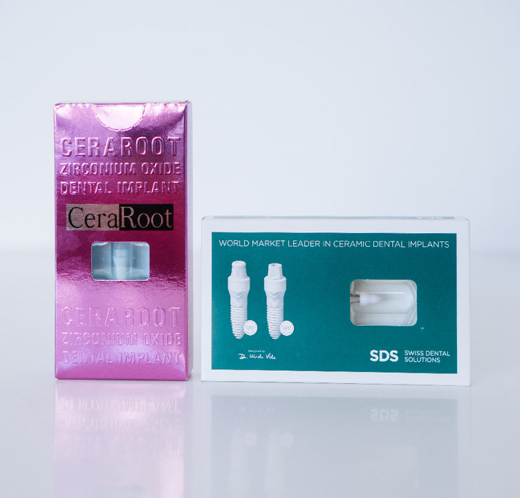 Product boxes for CeraRoot Zirconium Oxide and SDS Swiss Dental Solutions ceramic dental implants, showcasing metal-free alternatives for holistic tooth replacement.